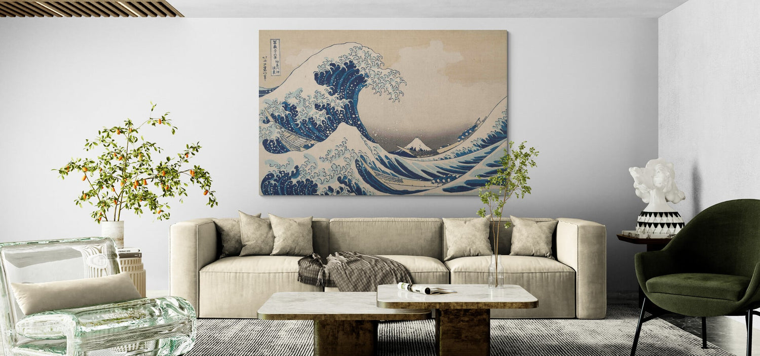 Large Great Wave wall art above a modern beige sofa