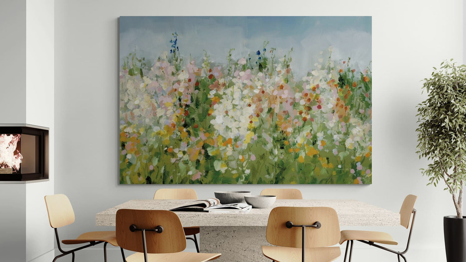 Dining room with a large floral painting on the wall