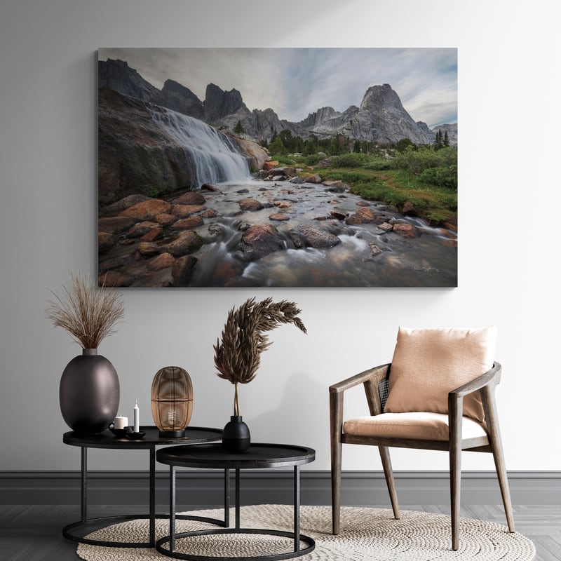 Cirque Of The Towers Waterfall by Alan Majchrowicz wall art in a living room