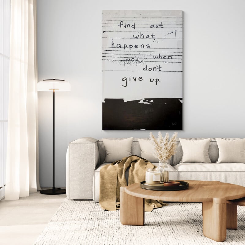 Don't Give Up by Kent Youngstrom wall art in a living room