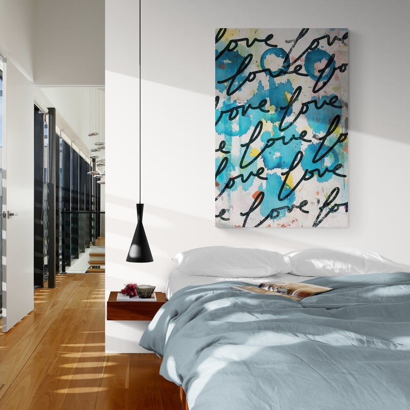 Lots Of Love II by Kent Youngstrom wall art in a bedroom