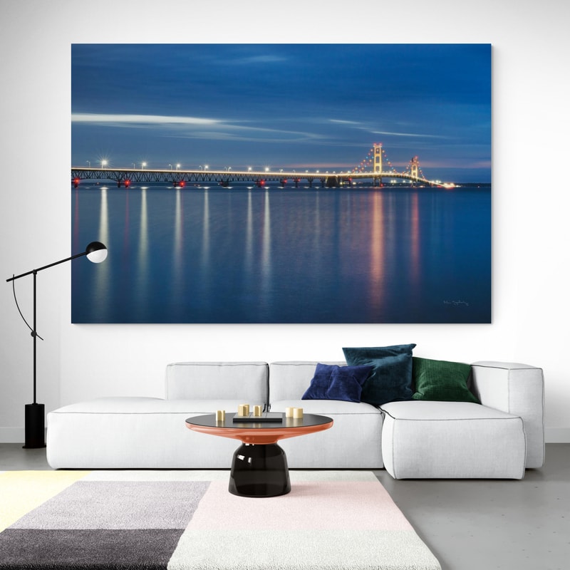 Mackinac Bridge by Alan Majchrowicz wall art in a living room