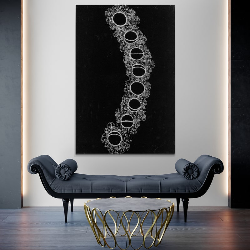 Moon Phrases by Julianne Wade wall art in a bedroom