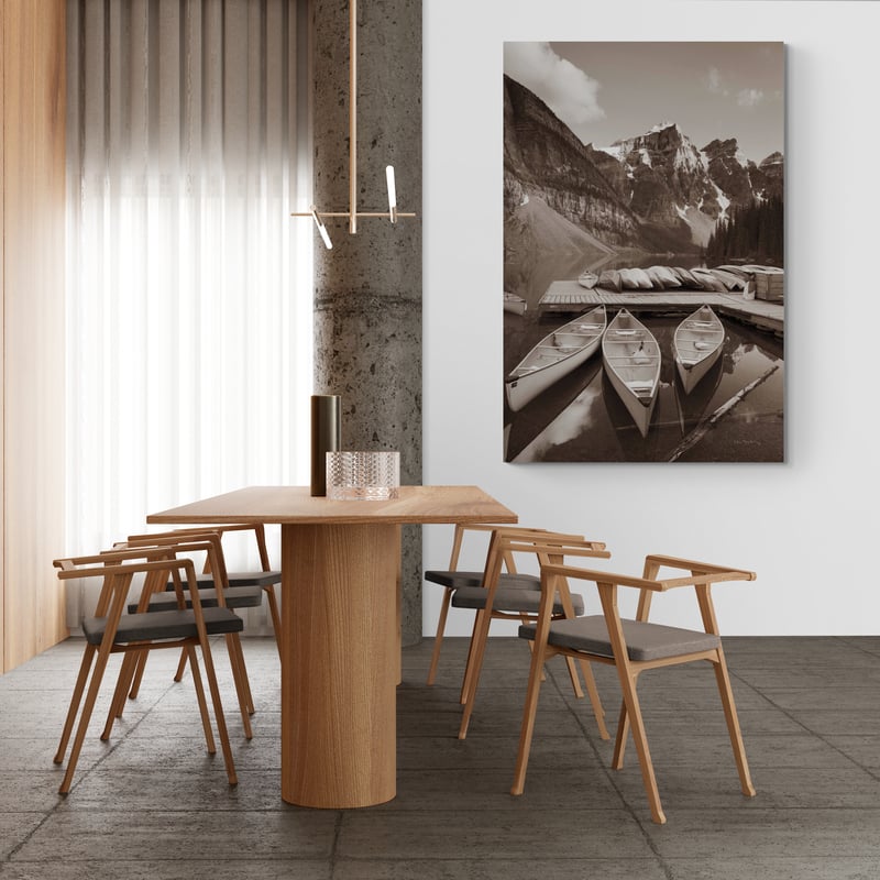 Moraine Lake Three Canoes by Alan Majchrowicz wall art in a dining room