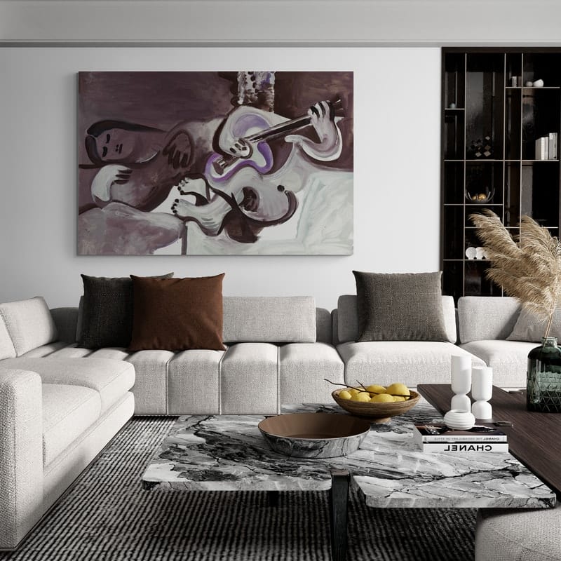 Nu couché et homme à la guitarre by Pablo Picasso wall art in a living room