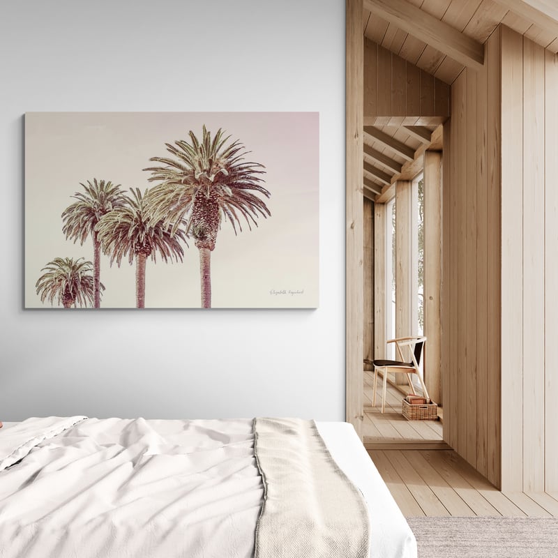 Pastel Palms by Elizabeth Urquhart wall art in a bedroom