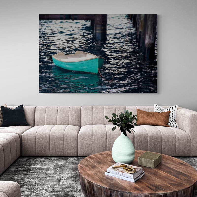 Rowboat by Elizabeth Urquhart wall art in a living room