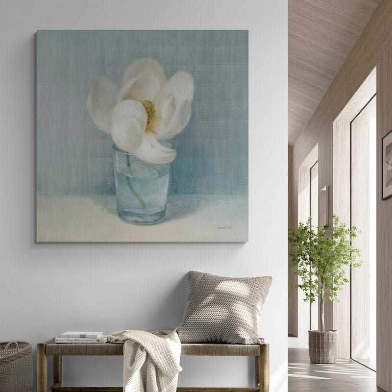 Single White Magnolia by Danhui Nai wall art in a living room