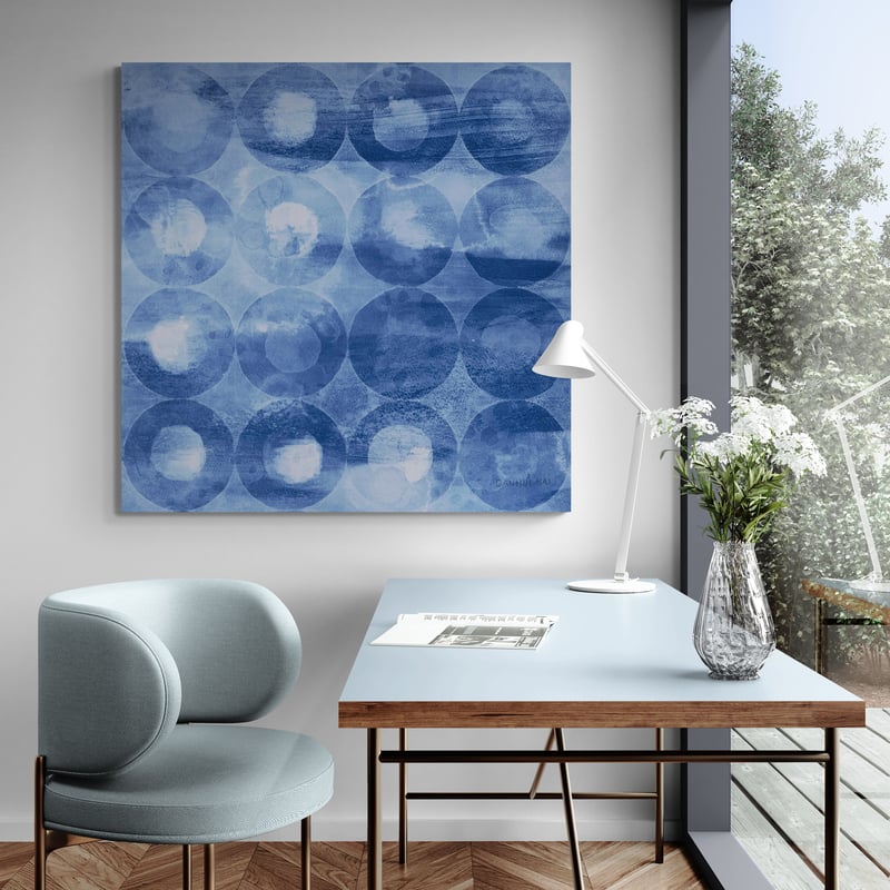 Touching Circles III Navy by Danhui Nai wall art in a living room