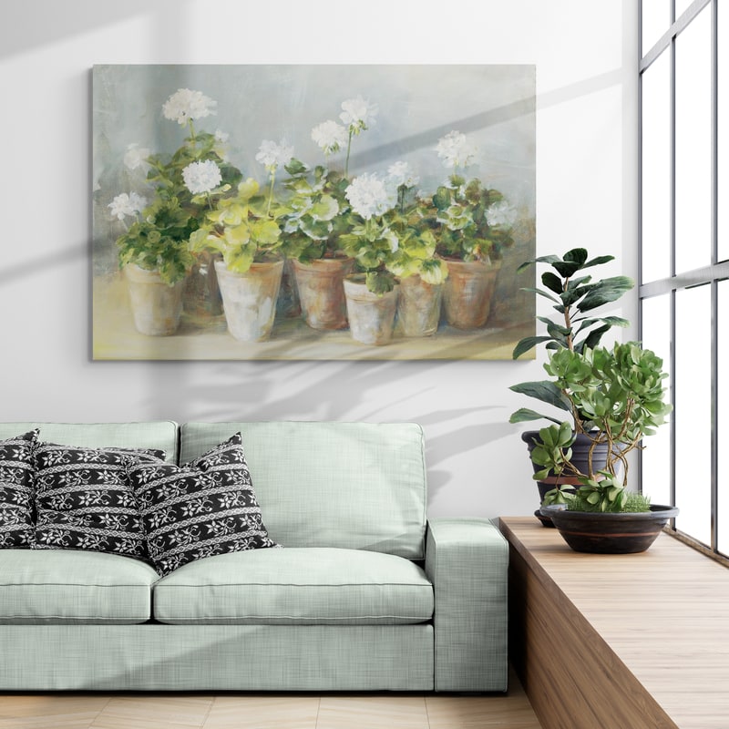 White Geraniums by Danhui Nai wall art in a living room